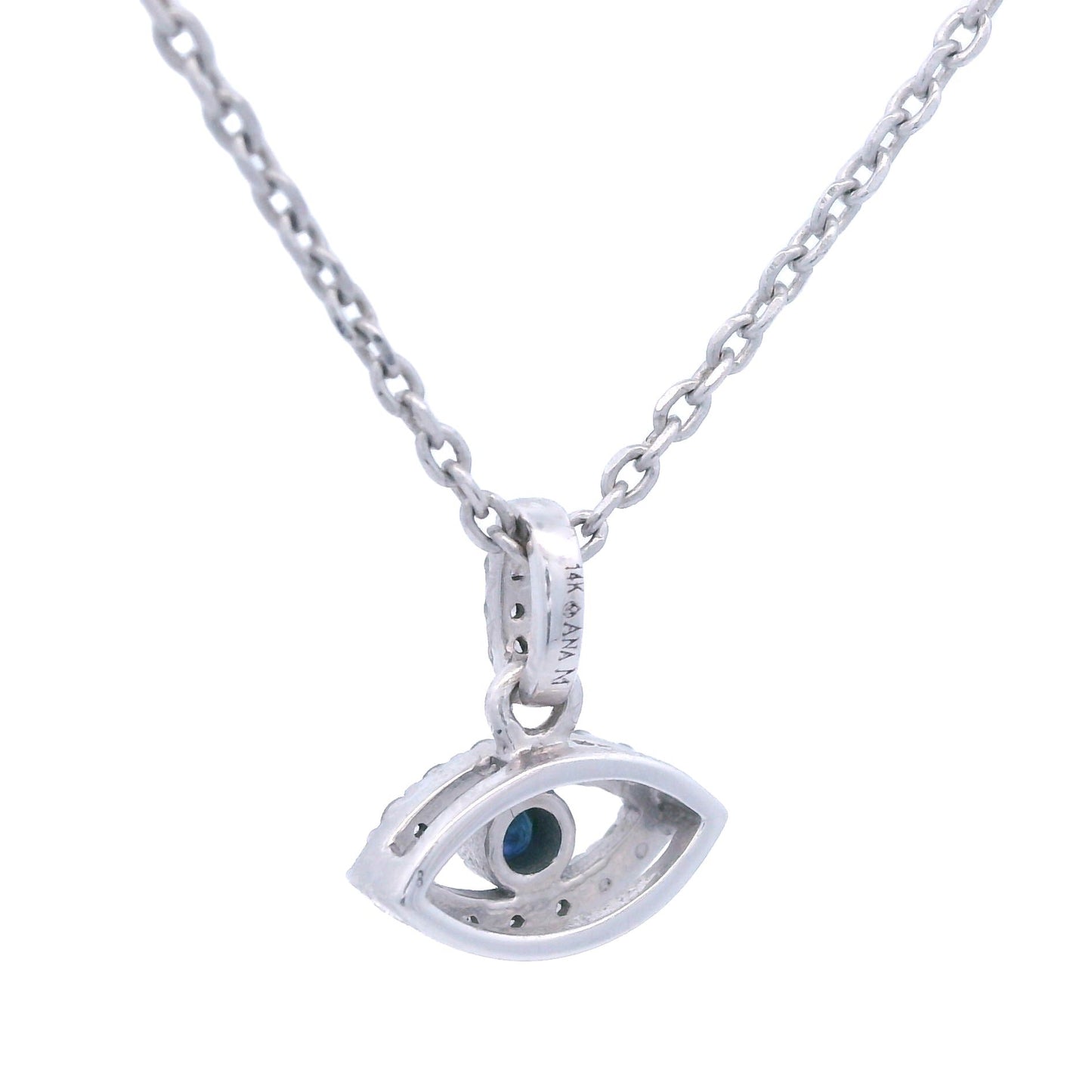 Front view of a white gold eye pendant outlined with white diamonds and has a blue sapphire in the center. The white gold pendant is held by a thin white gold chain.