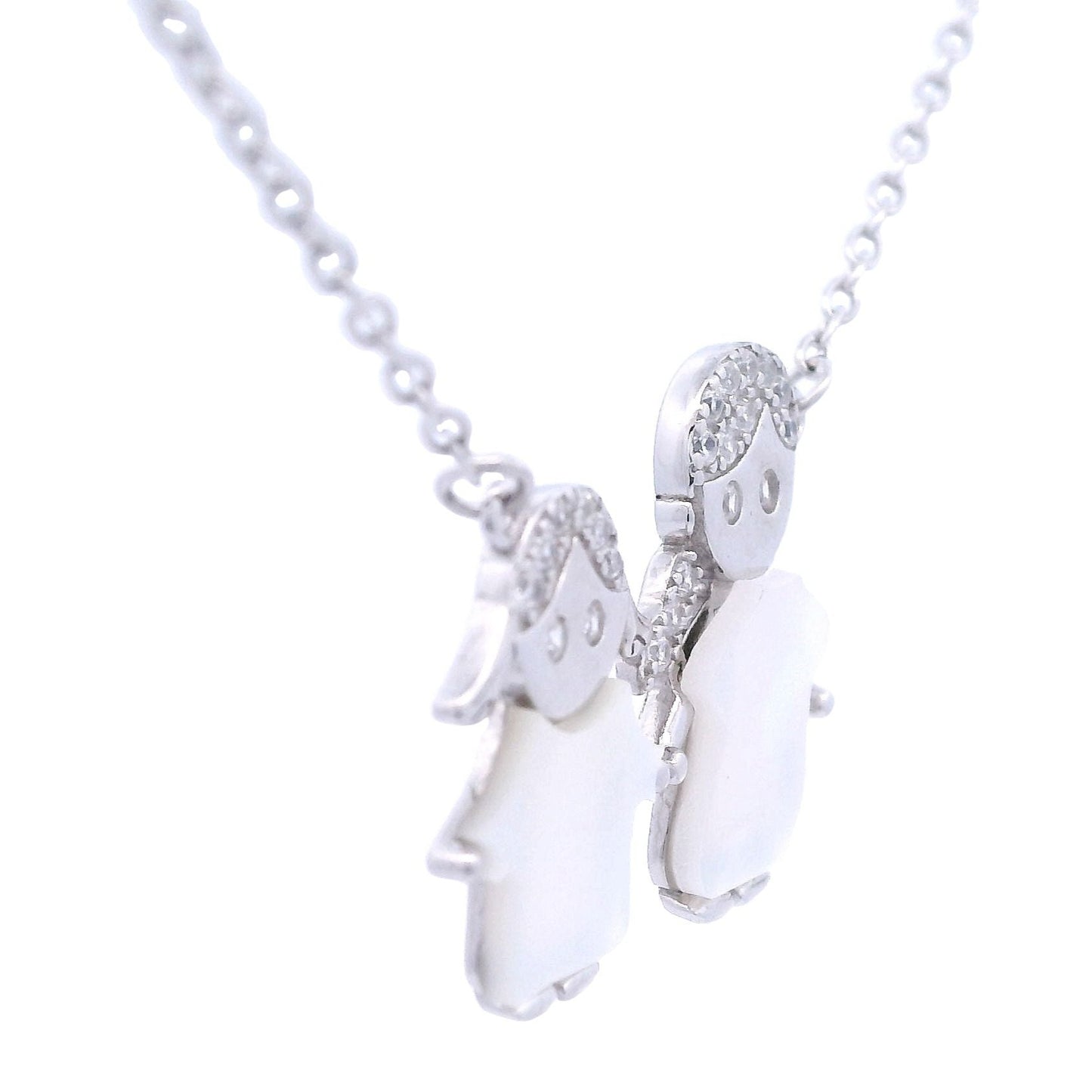 Sterling silver necklace of two girls holding hands. Side view.