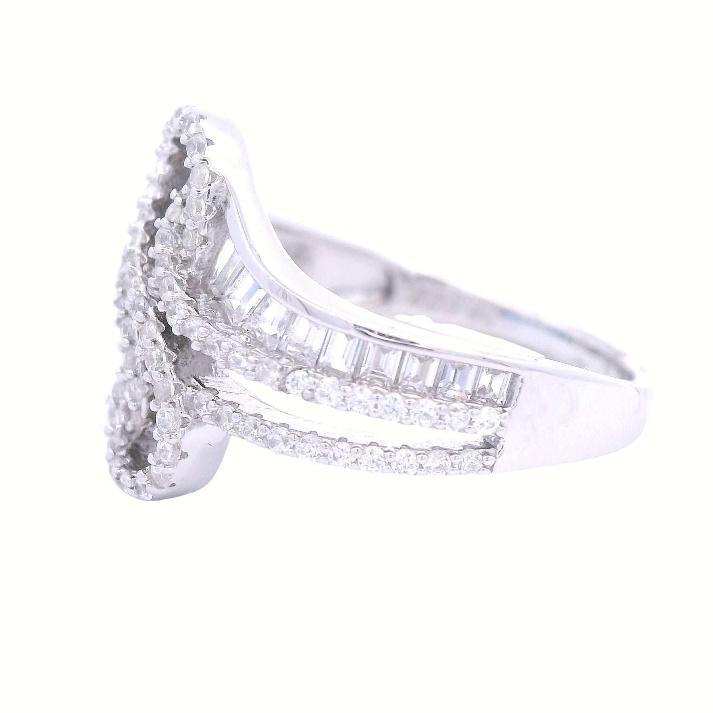 Side view of sterling silver ring with infinity in the center lined with clear pave zirconia. Each side has baguette zirconia one side is clear and the other is royal blue.