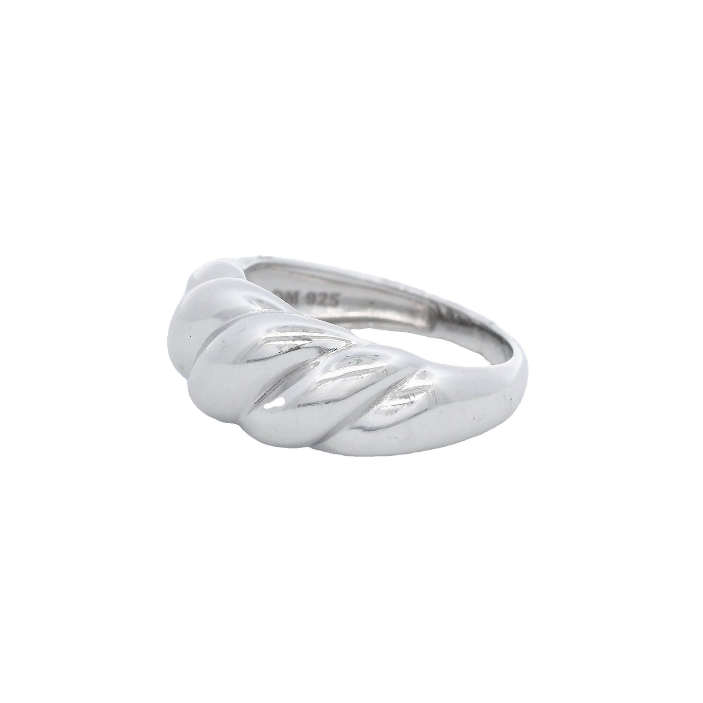 Side view of silver ring that has graduated swirls with the largest in the center like a croissant.