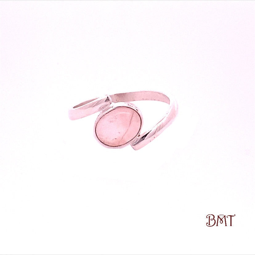 Round Cut Rose Quartz Ring with a simple Wraparound Design