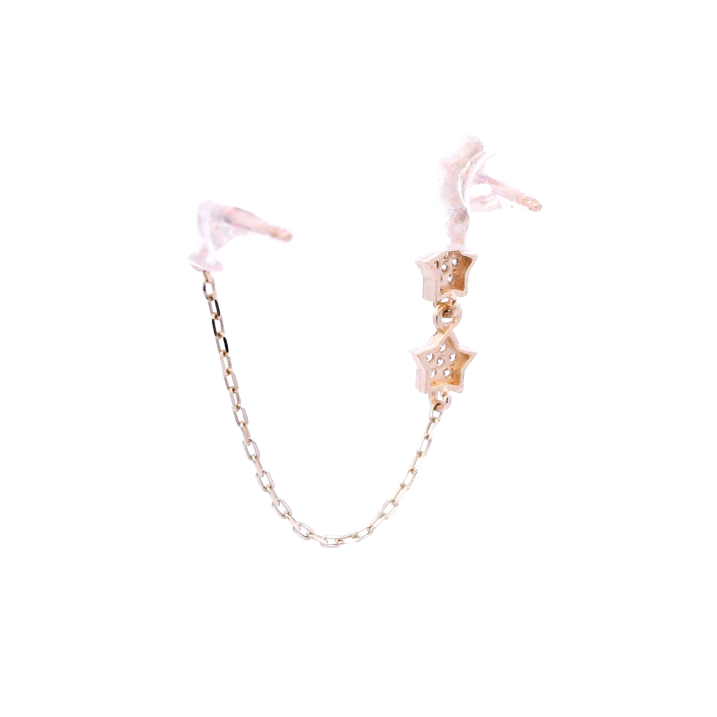 Back view of a yellow gold stud with 3 small stars that are vertically aligned, and a yellow gold stud of a crescent moon. Both studs have white zirconia and they are connected by a thin gold chain.