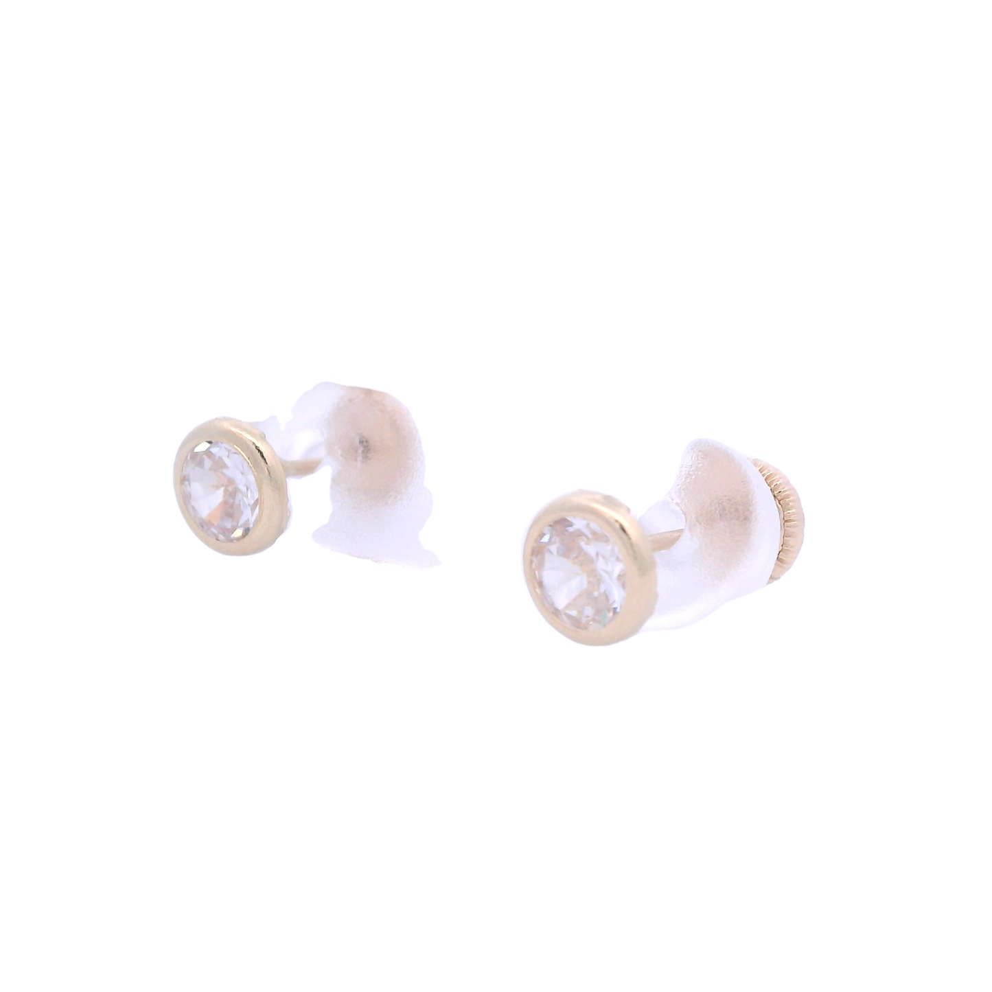 Angled view of 5mm flat round stud with a gold base a white zirconia.