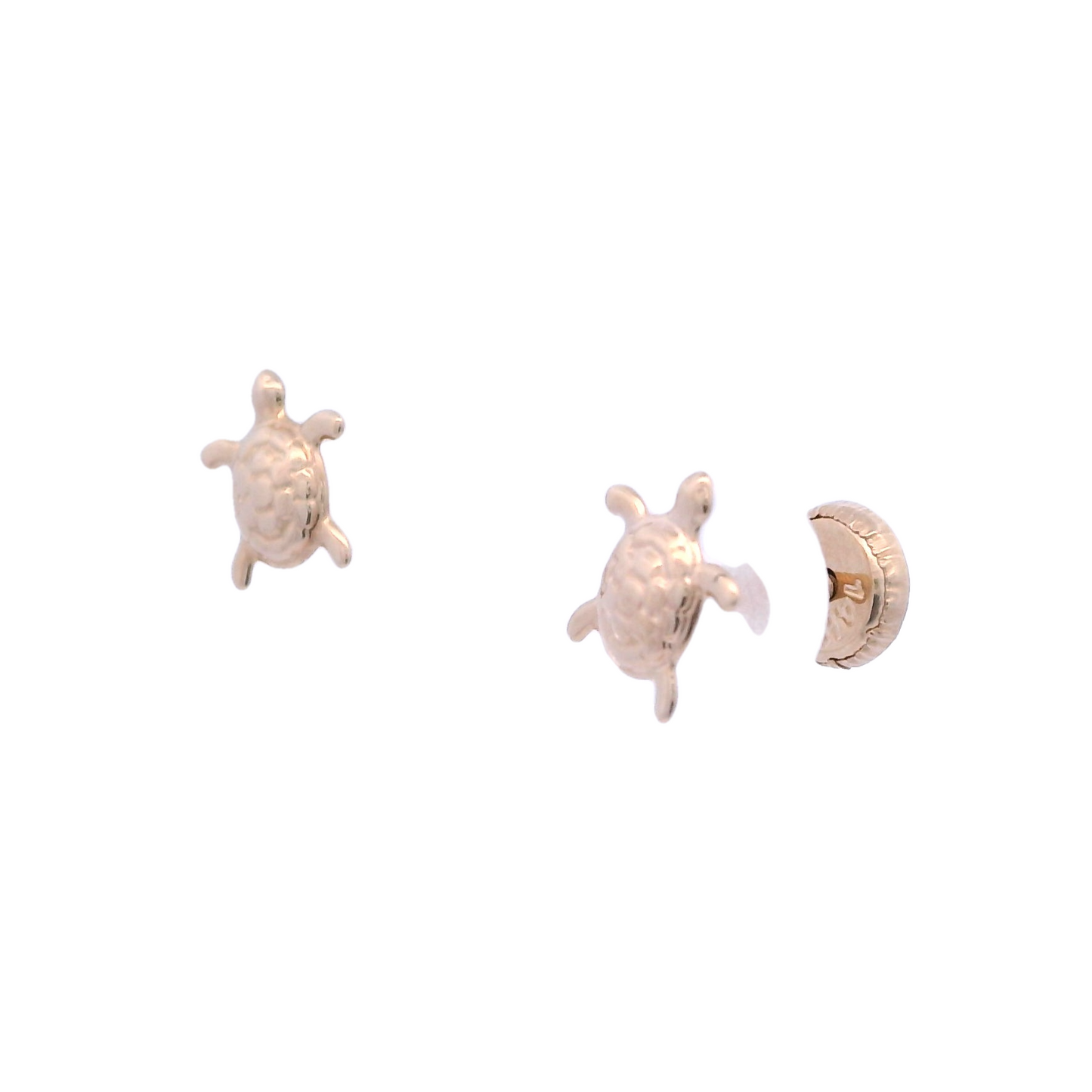 Side view of yellow gold stud earring in a turtle shape with a textured center.
