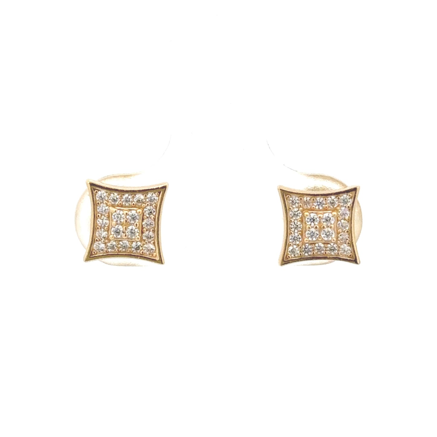 Gold screw-back studs with two layers of zirconia outlined by a solid border to create the look of a sparkle or a square. Close up.
