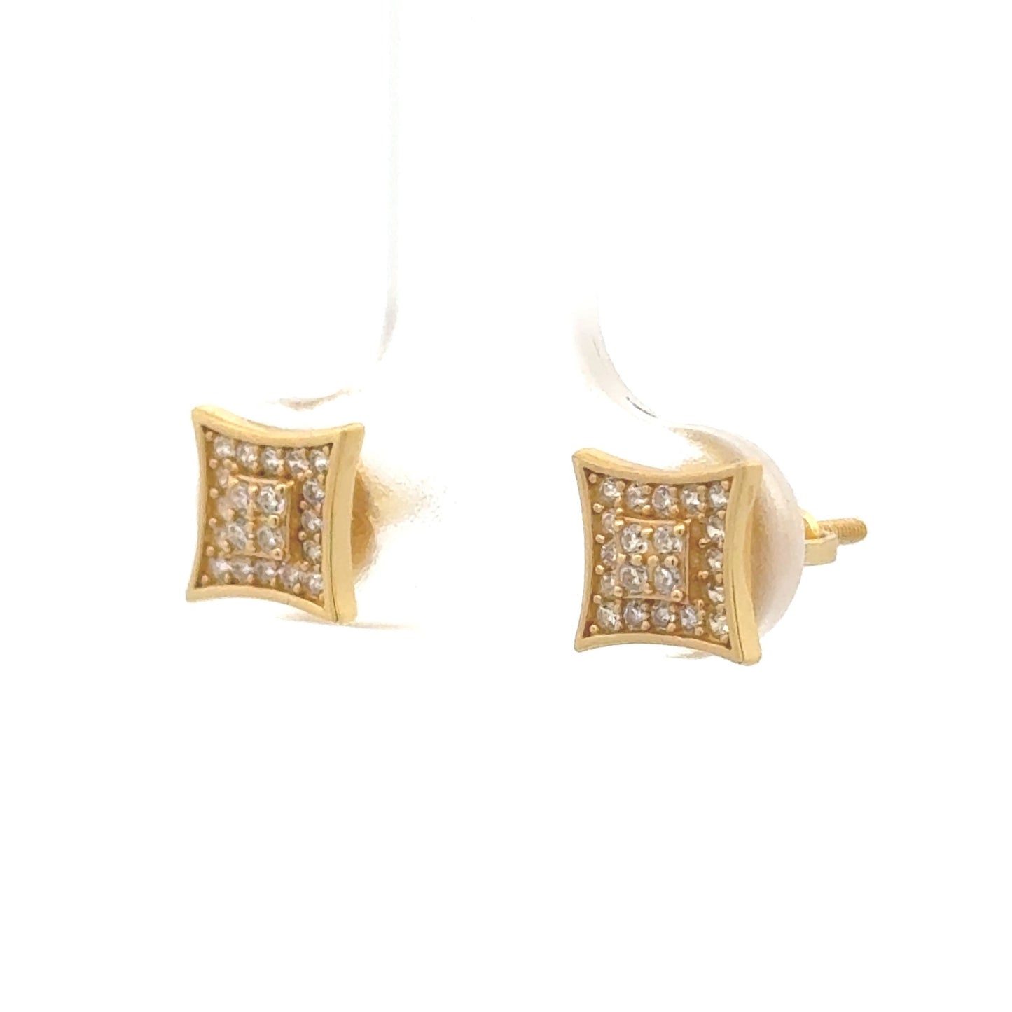 Gold screw-back studs with two layers of zirconia outlined by a solid border to create the look of a sparkle or a square. Side close up.