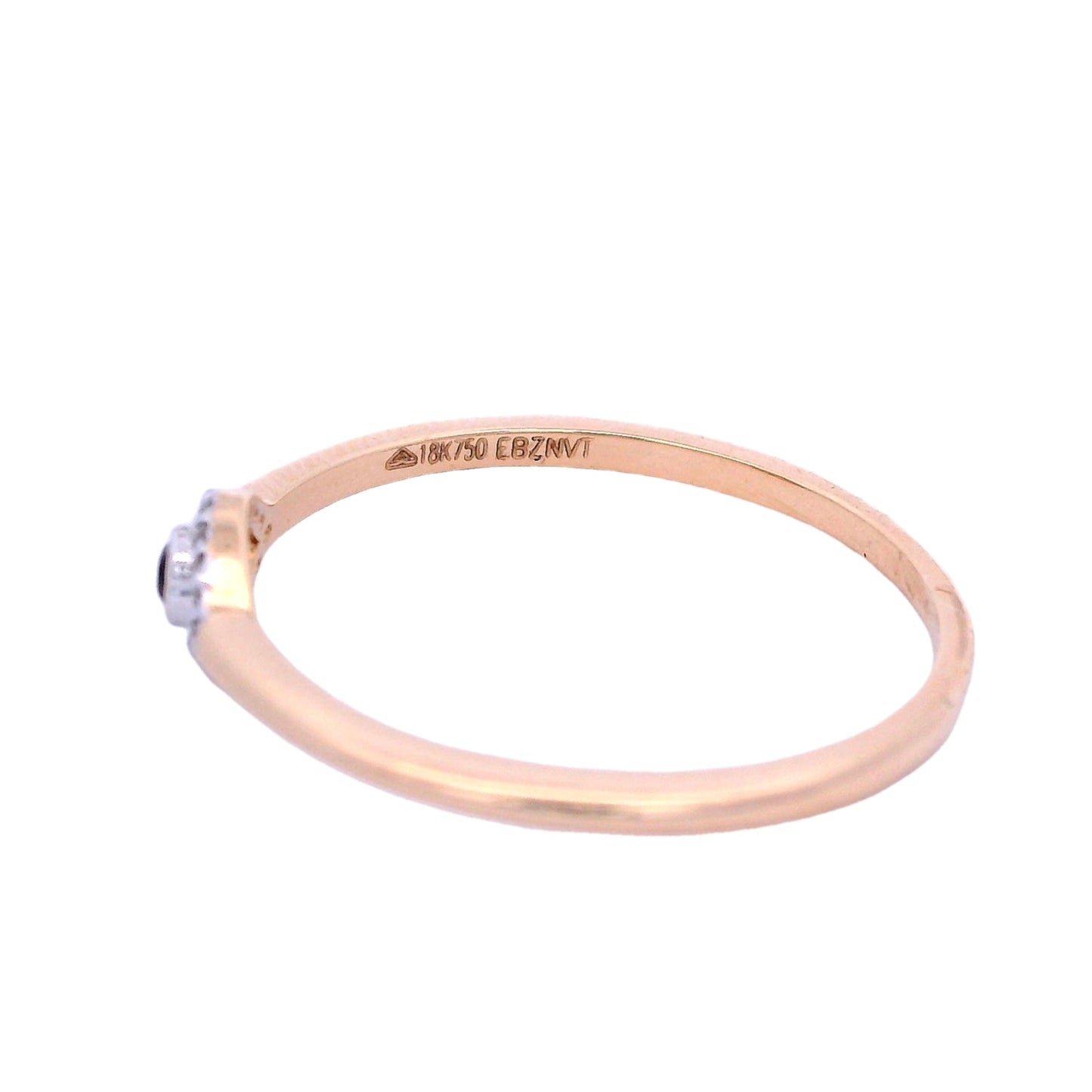 Side view of yellow gold ring. The ring has a smooth band. In the center there is an eye shape. The outline of the eye has small white diamonds. The center of the eye has a dark almost wine color ruby with a thin yellow gold outline.