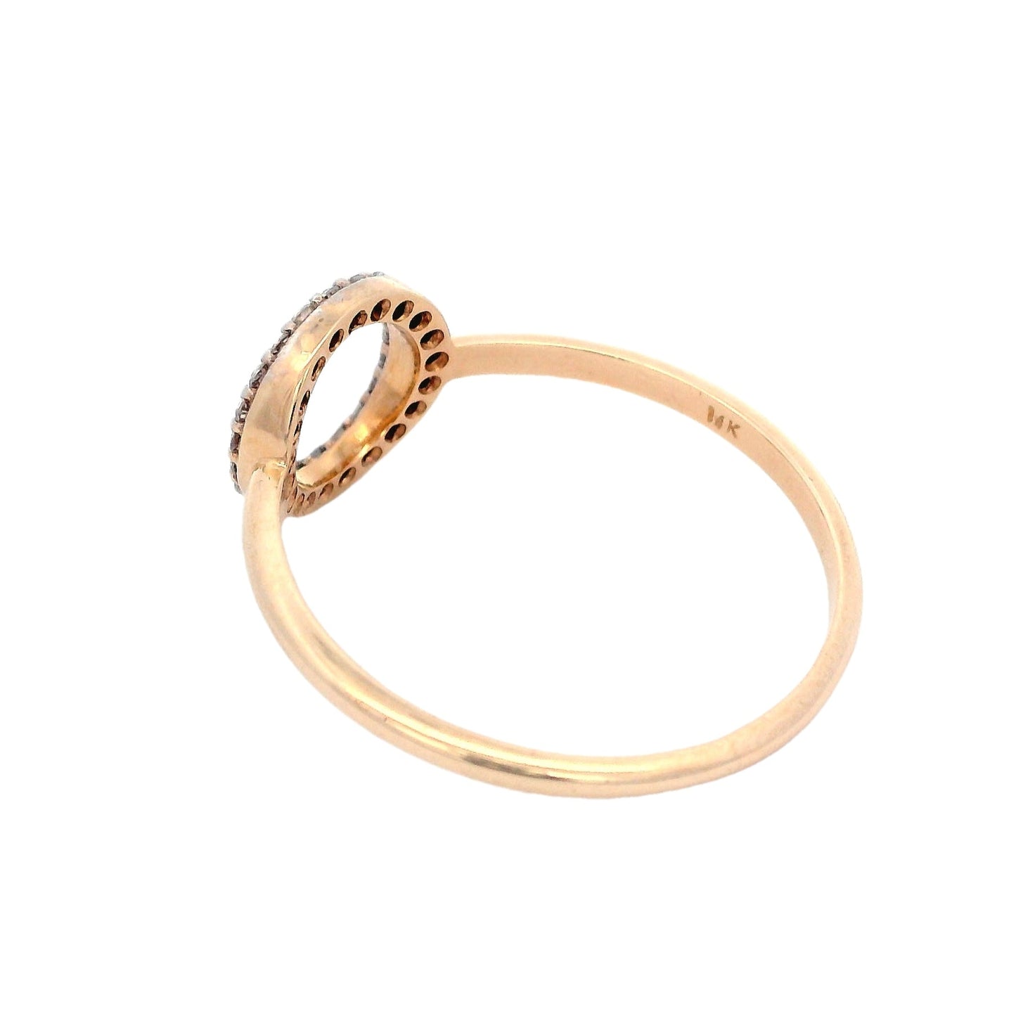 Side back view of yellow gold ring. The ring has the outline of a circle in the center. The circle is outlines with white diamonds.