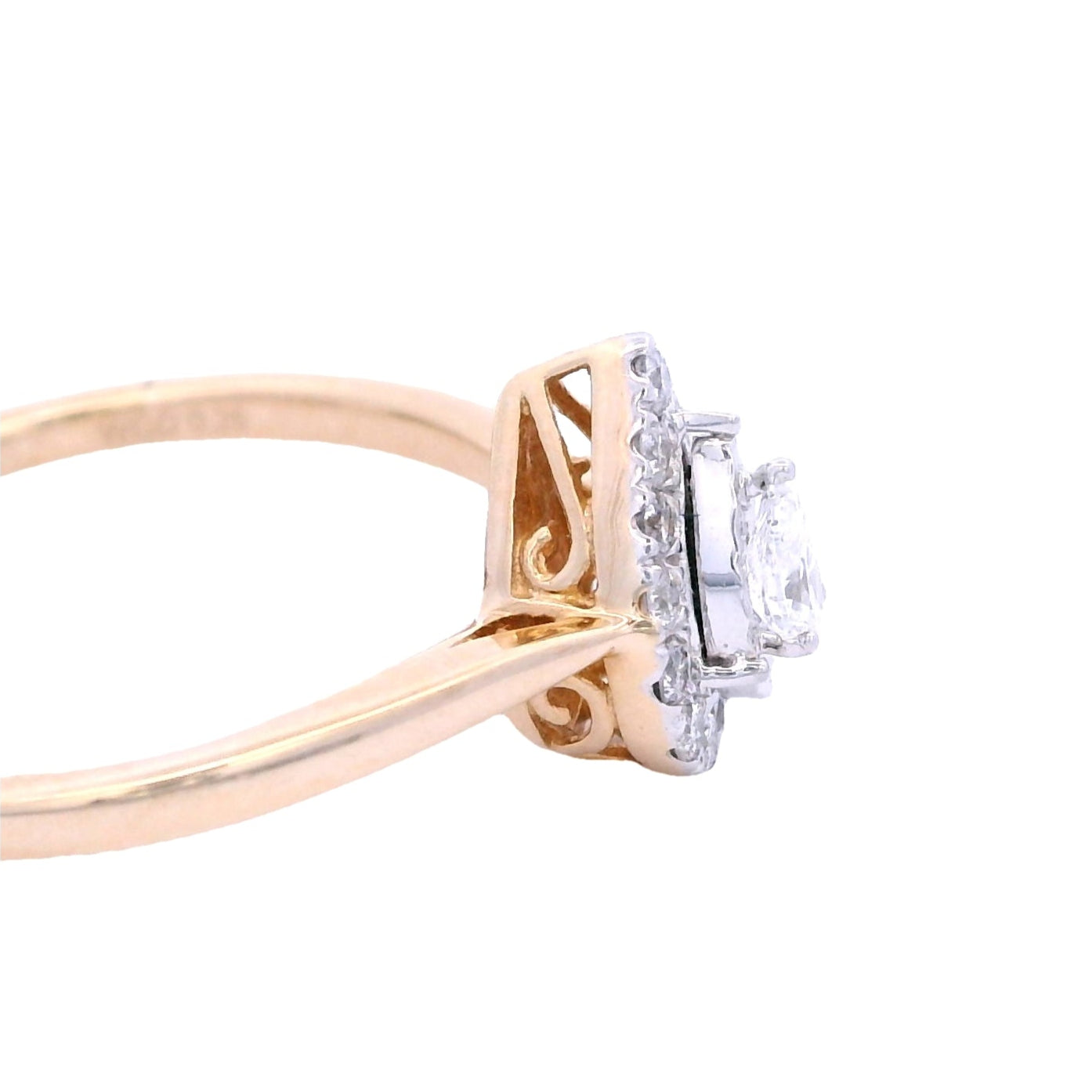 Side view of engagement ring with pear-shaped front. It has a small white diamond and a halo with round white diamonds.