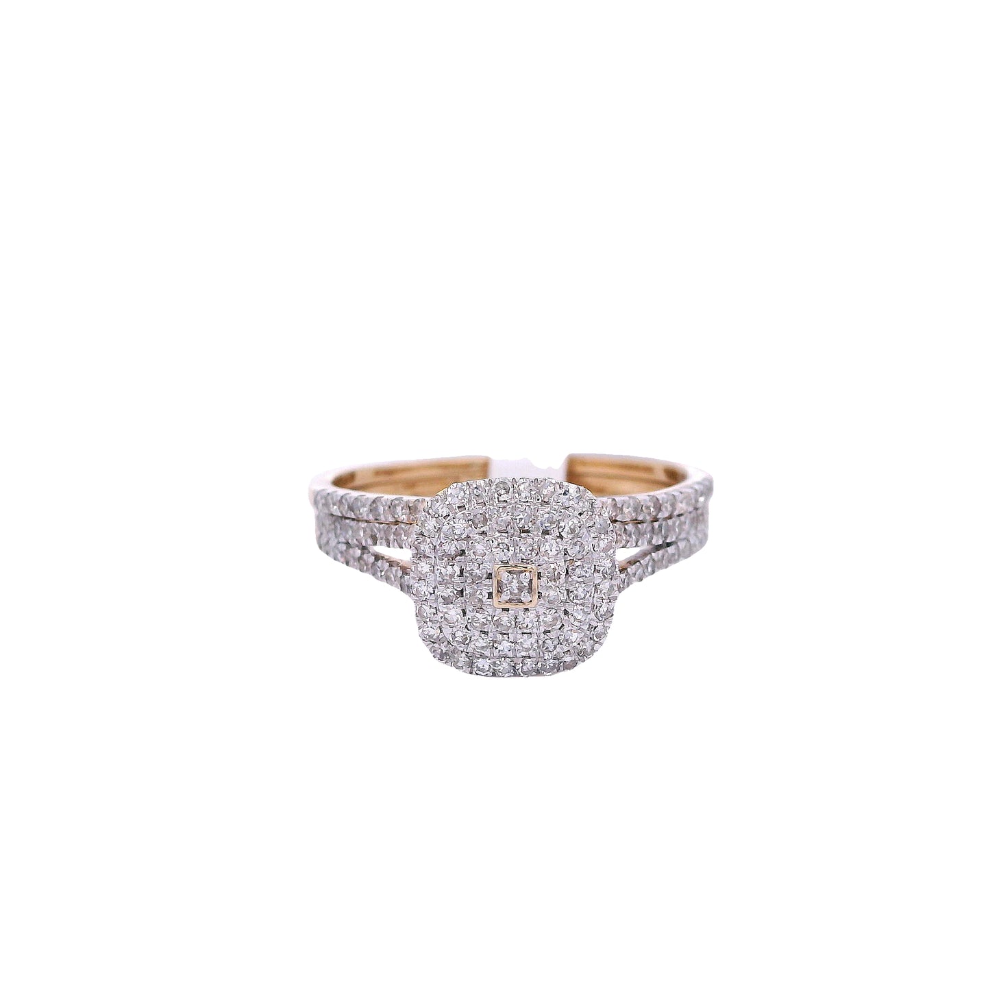 Front view of Yellow gold bridal set. The engagement ring has a cushion center with small round diamonds. The small round diamond in the center is outlined in gold. The ring also has a double halo with small round diamonds. The engagement ring band has two rows of round diamonds that merge into one row on each side. The wedding band has small round diamonds and is laying perfectly over the engagement ring.