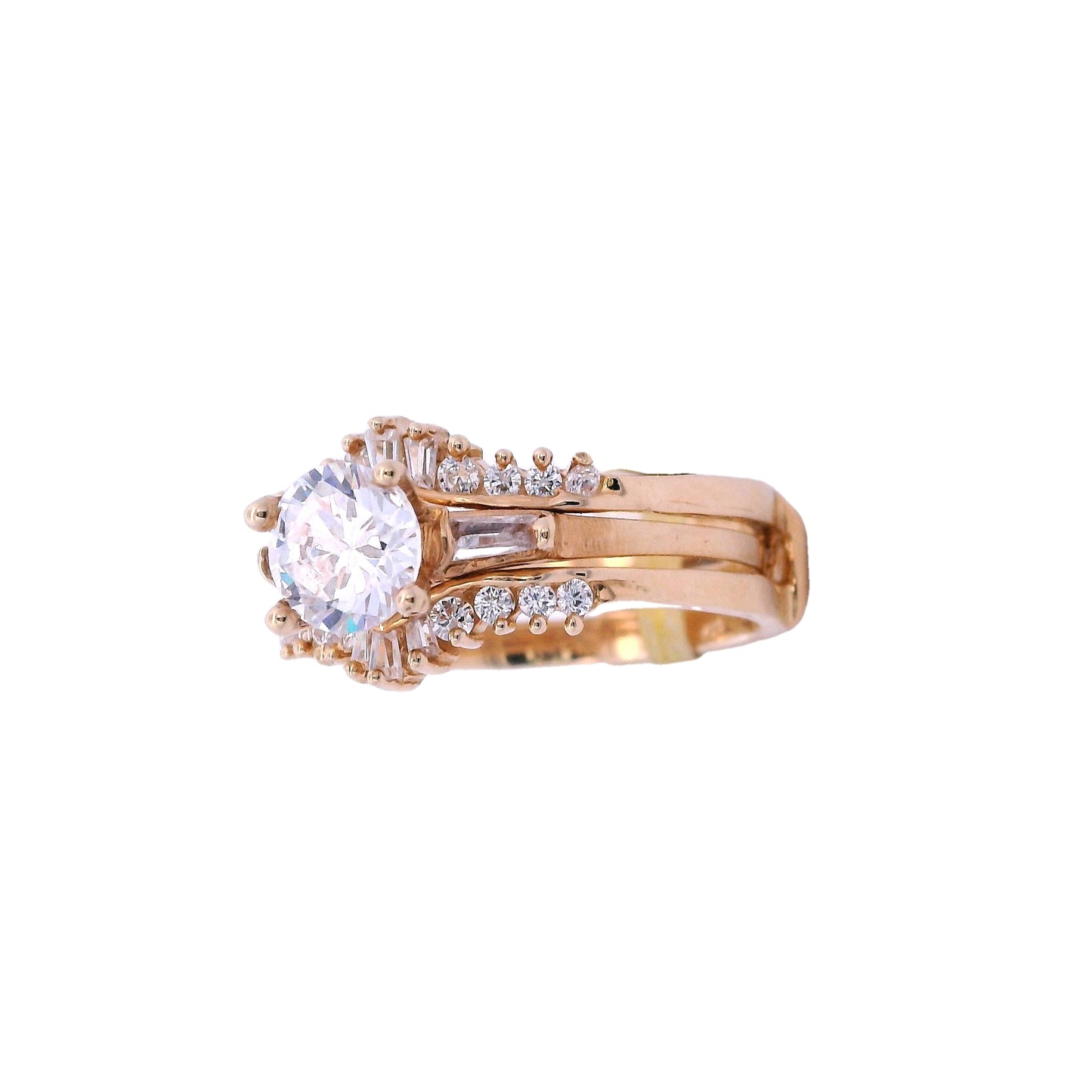 Side view of yellow gold ring with enhancer. The engagement ring has a single white zirconia in the center and 2 white baguette zirconia on each side. The enhancer has graduated baguettes in the center and round white zirconia on the sides.