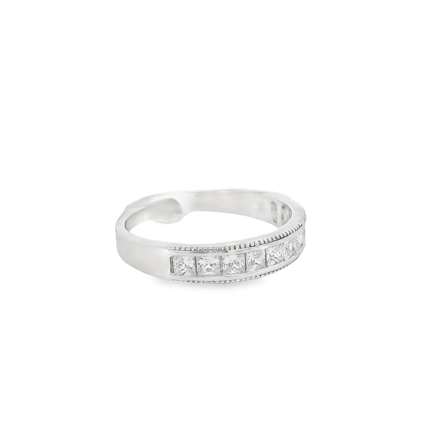 Side view of the thicker wedding band. The wedding band is on the bottom; it has small square zirconia