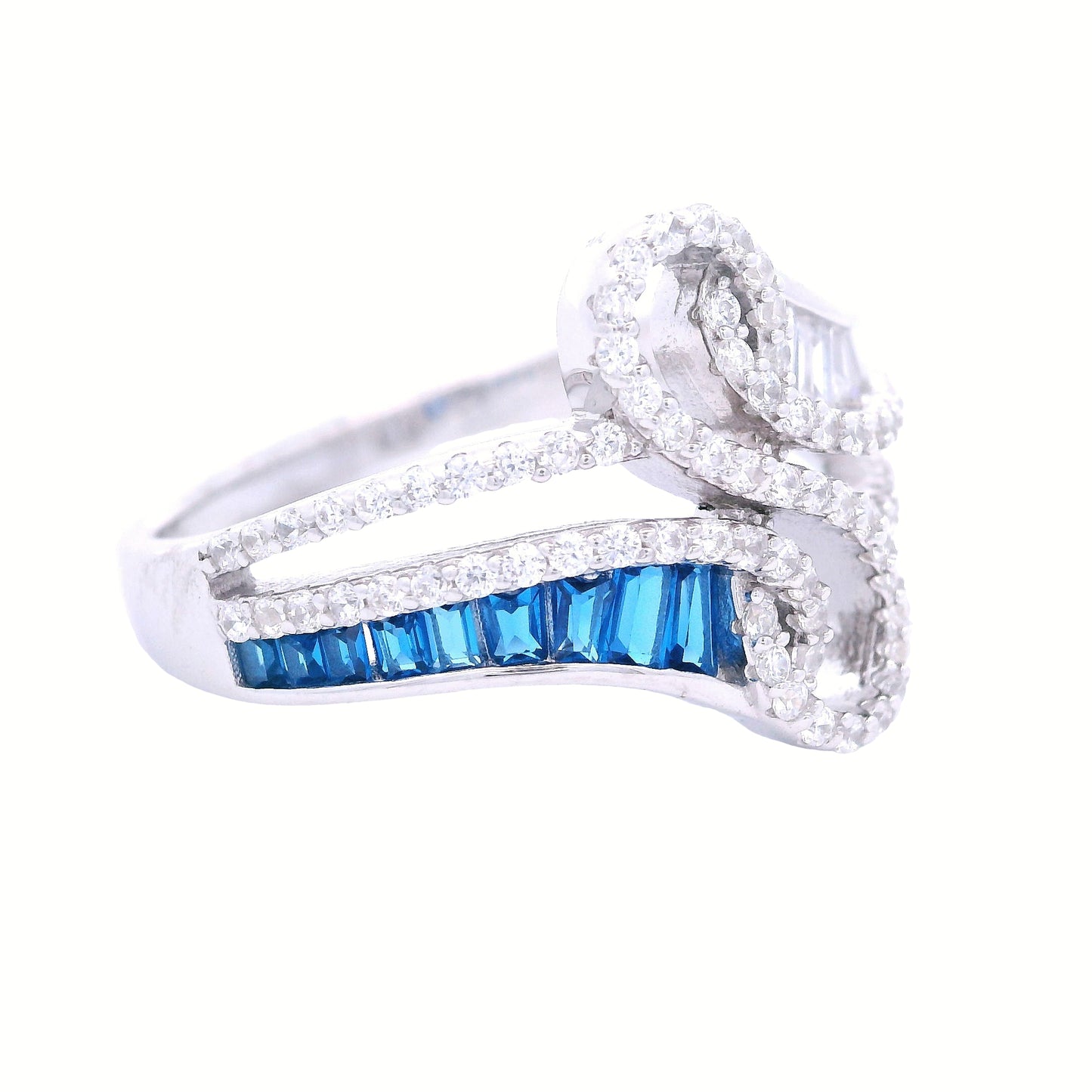 Side view of sterling silver ring with infinity in the center lined with clear pave zirconia. Each side has baguette zirconia one side is clear and the other is royal blue.