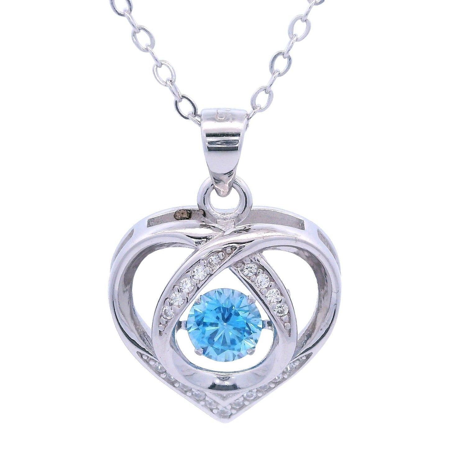 Close up of Sterling Silver heart pendant with white zirconia accents and a blue dangling zirconia in the center.