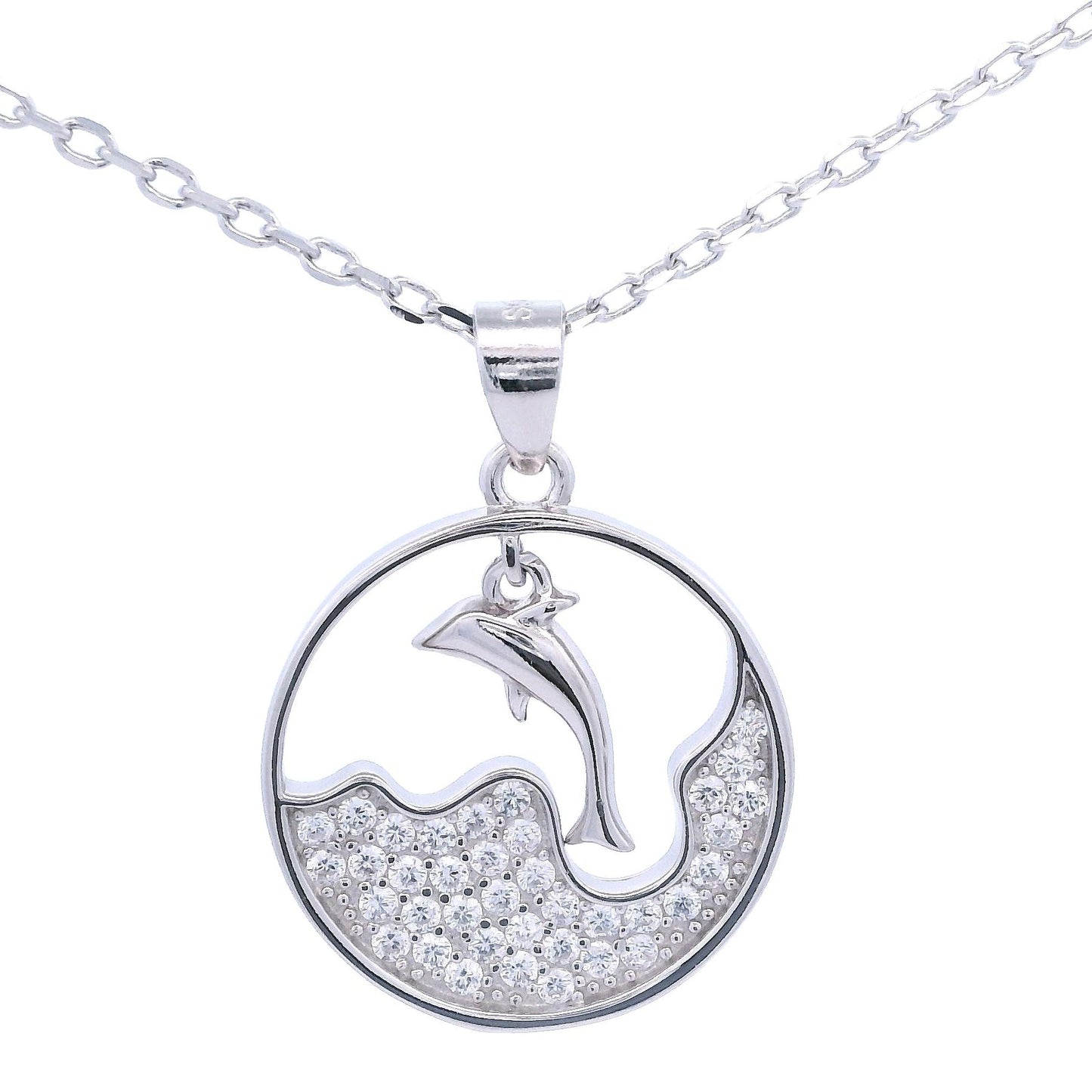 Silver necklace with round pendant that had a wave design with zirconia and a dangling dolphin in the center.