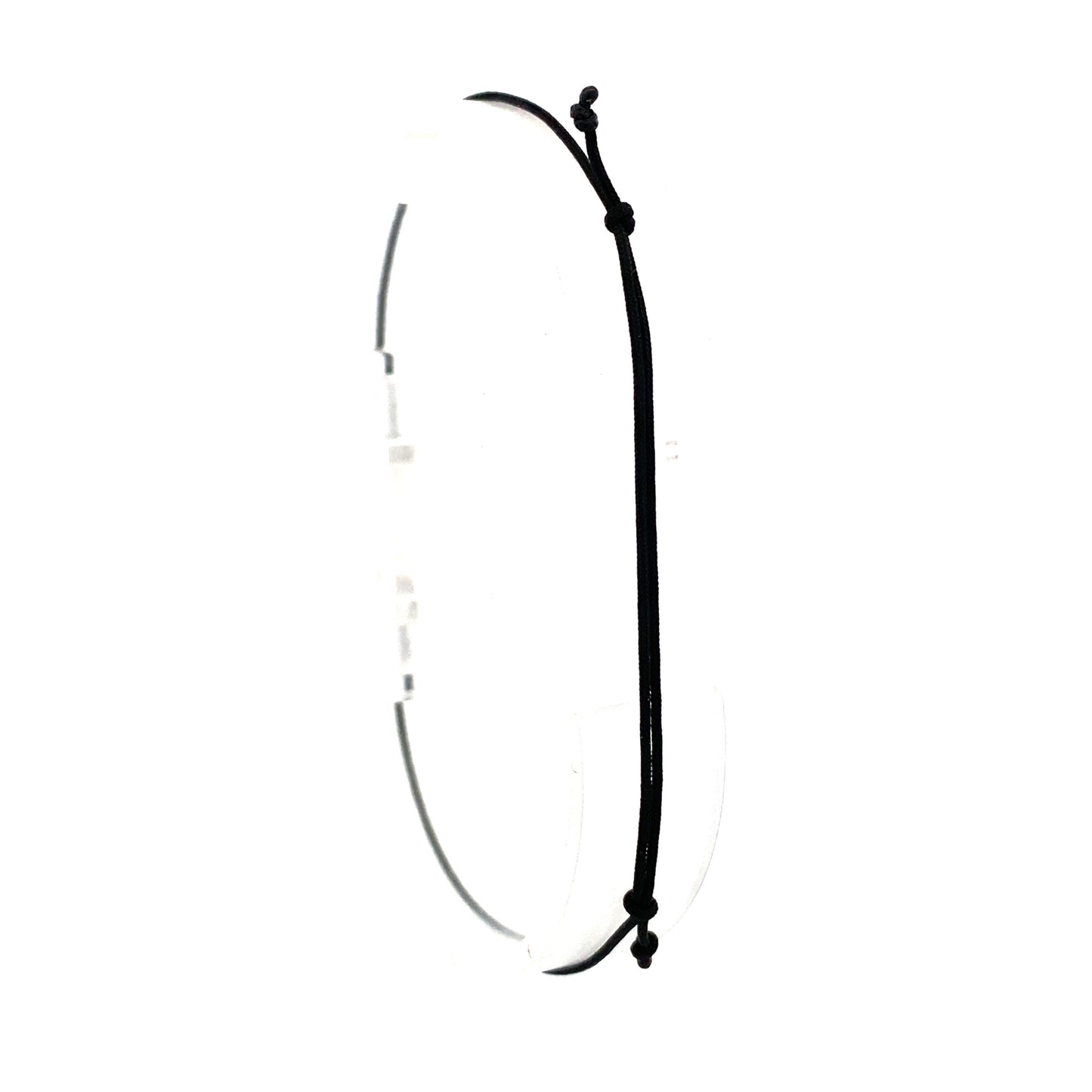 Handmade adjustable black string bracelet with a Mother of Pearl clover in the center and 2 gold beads on each side. Back view.