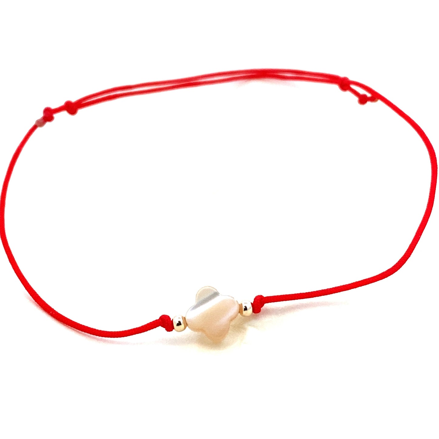 Handmade adjustable red string bracelet with a Mother of Pearl clover in the center and 2 gold beads on each side. Full bracelet