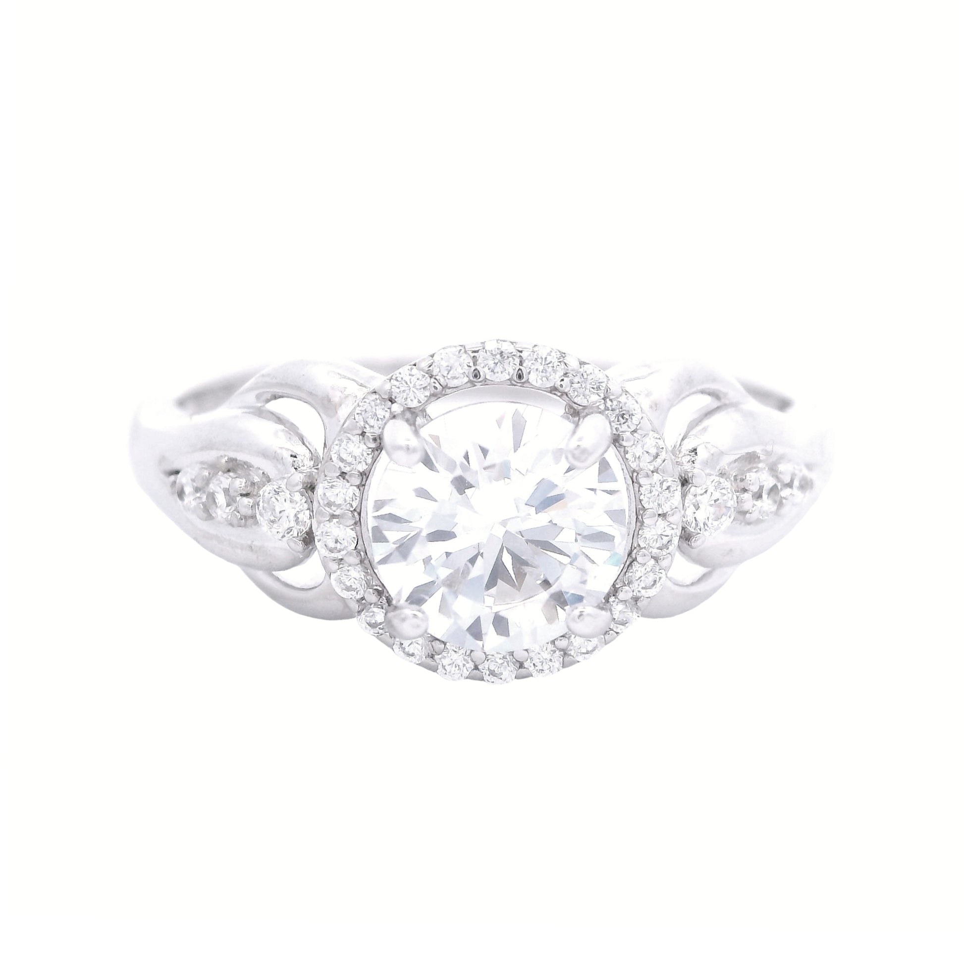 Front view of sterling silver ring with round-shaped zirconia in the center and a round halo.  It has decorative swirls with round zirconia accents on each side.