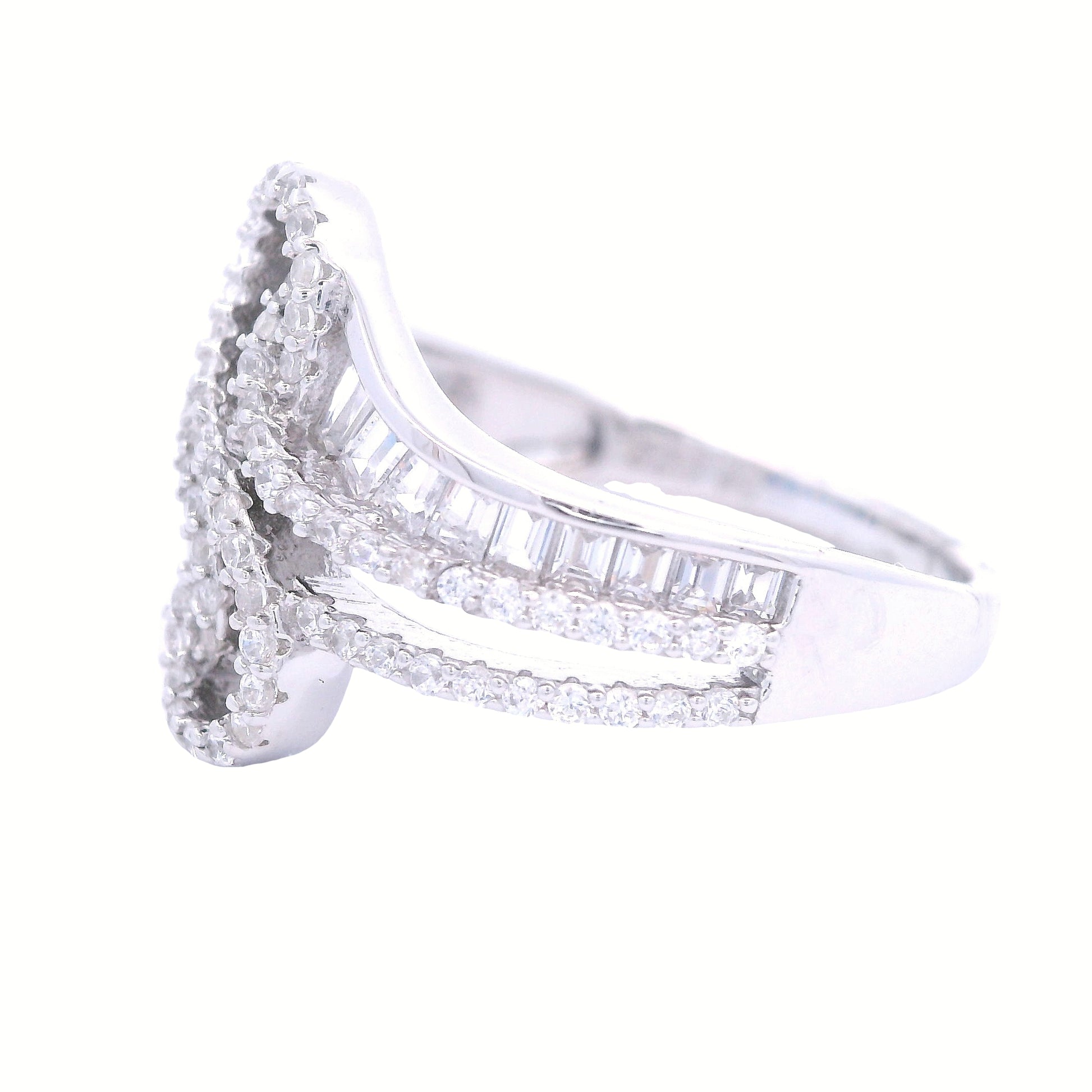 Side view of sterling silver ring with infinity in the center lined with clear pave zirconia. Each side has baguette zirconia one side is clear and the other is royal blue.