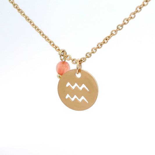 A gold-plated stainless steel chain necklace with a round gold disc pendant featuring a cutout symbol of the Aquarius zodiac sign, adorned with a small bead, on a white background.