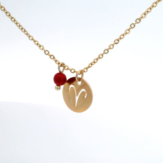 A gold-plated stainless steel chain necklace with a round gold disc pendant featuring a cutout symbol of the Aries zodiac sign, adorned with a small bead, on a white background.
