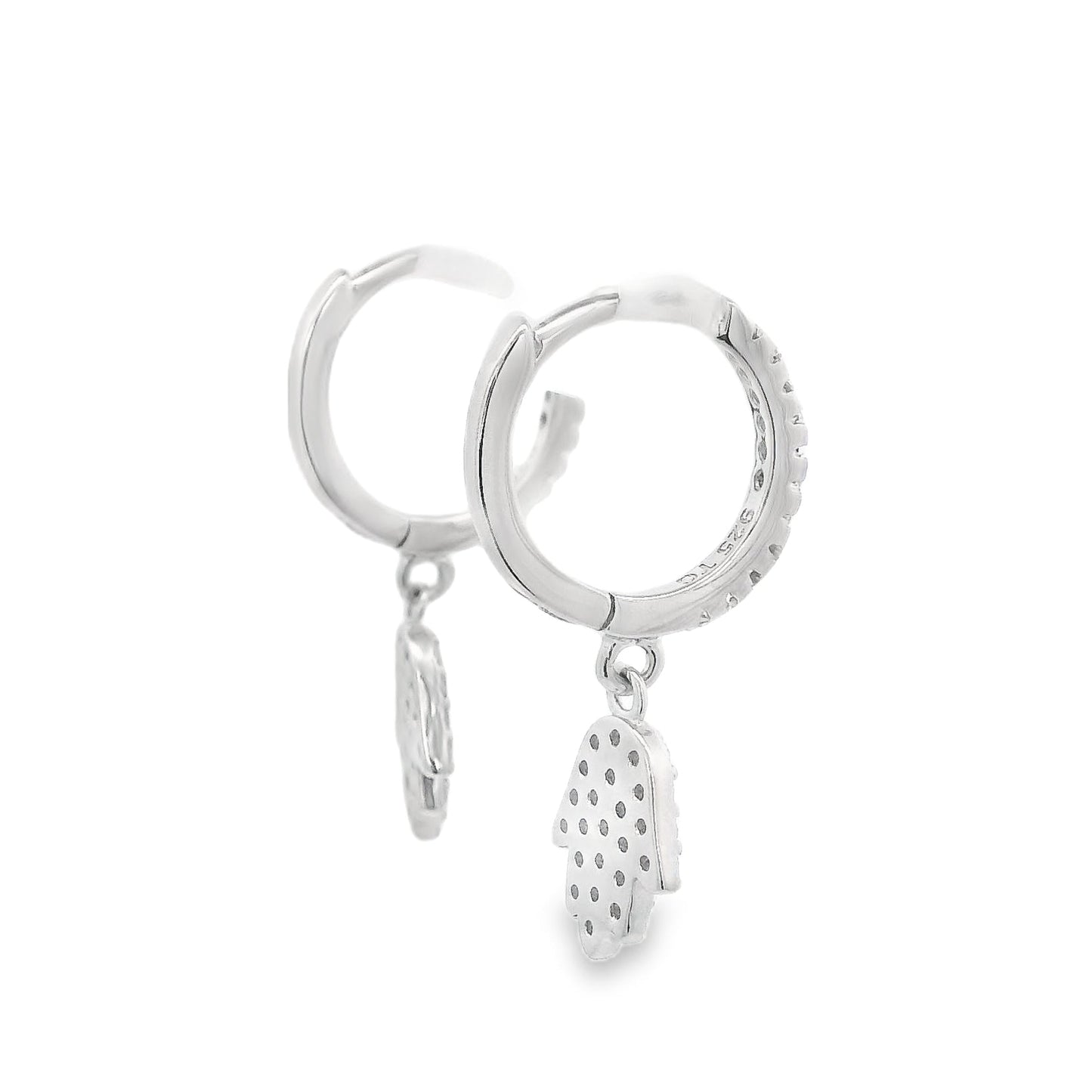 Angled back view of silver hoops with round clear zirconia and a hamsa hand that dangles below each huggie that also has round zirconia inside it.