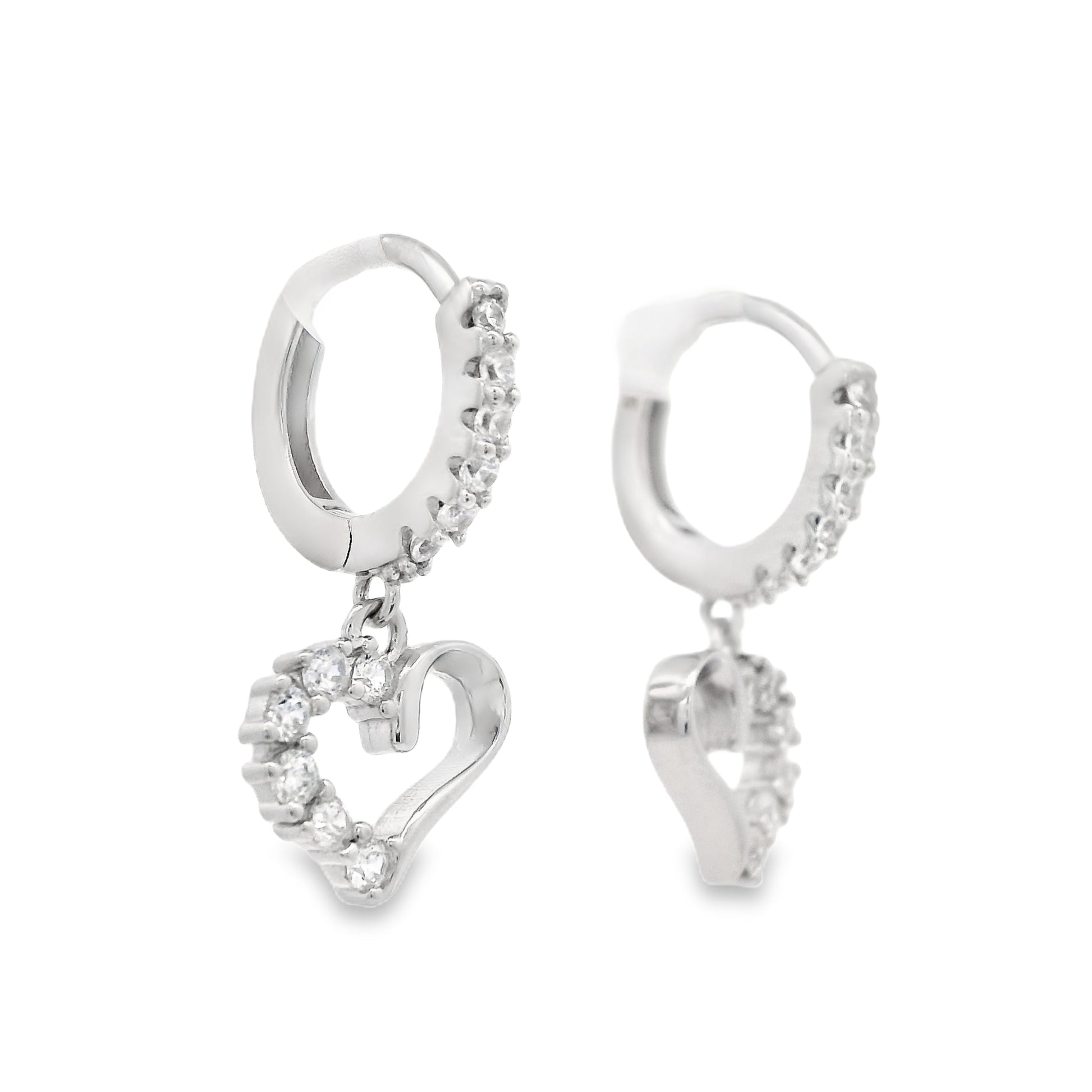 Angled view of a pair of silver heart dangle hoop earrings with pave zirconia accents.
